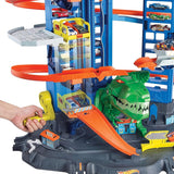 Garage ultime Hot Wheels City Robo T-Rex, mode multi-niveaux et multi-jeux, peut contenir plus de 100 voitures à l'échelle 1:64, idée de cadeau pour les enfants de 3 ans et plus